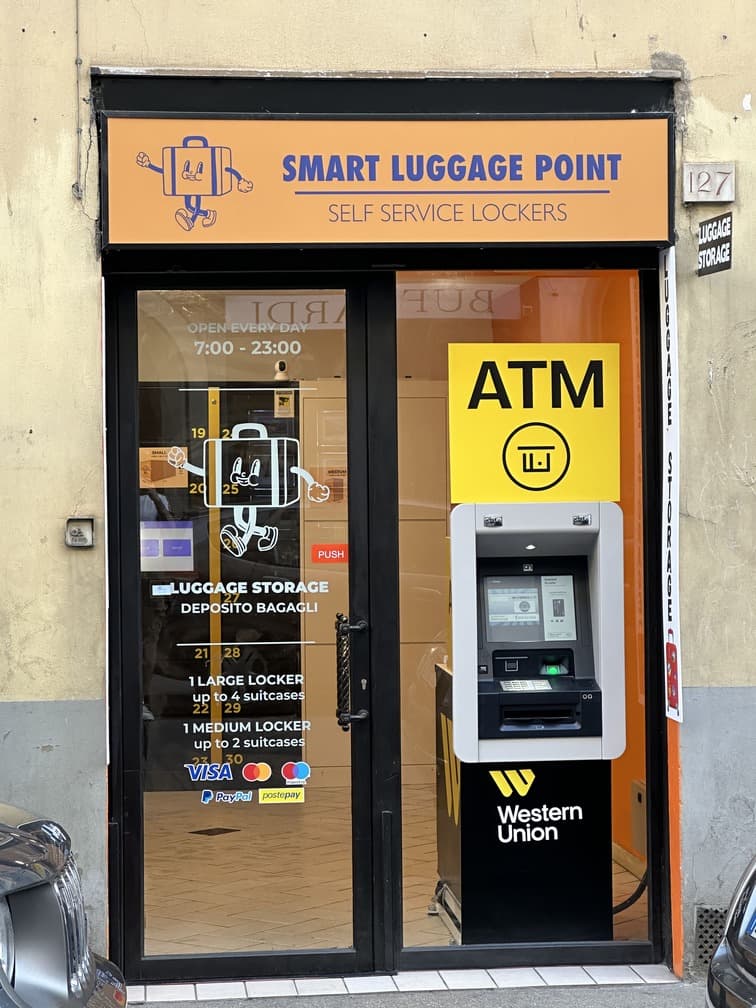 Customer using self-service luggage locker terminal