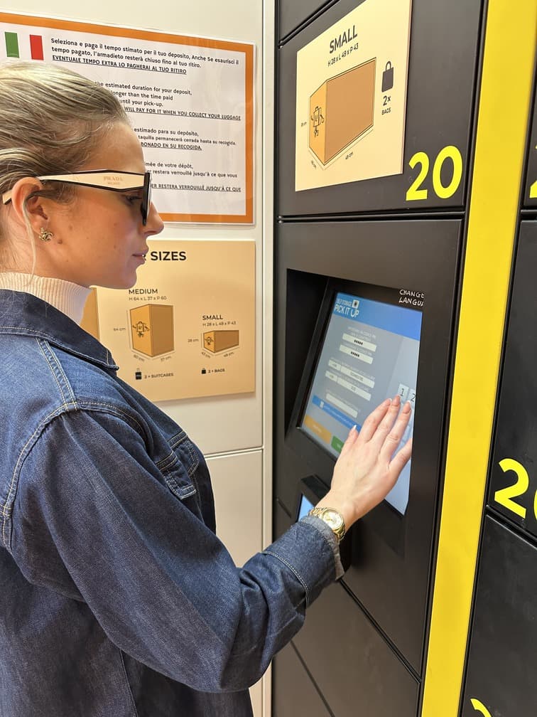 Customer selecting locker size on touch screen